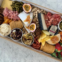 Load image into Gallery viewer, Serves up to 15 people. Large Grazing Boxes help take the stress out of catering your next casual or formal event and suitable for a range of different occasions and includes: Cheese - two hard, two soft Cured meat (300g two varieties - upgrade includes additional 200g) Dip - two variations Antipasti items, dried and fresh fruit (assorted) Including a substantial range of high-quality, locally sourced produce consisting of premium cheese, cold meats, nuts and gluten Grazing Boxes Perth