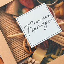 Load image into Gallery viewer, Serves 2 to 5 people. Intimate Grazing Boxes include a range of fresh, high-quality produce to enjoy on any given occasion and contains: Cheese - one hard, one soft Cured meat (100g - upgrade includes additional 100g) Dip - one variation Antipasti items, dried and fresh fruit (assorted) Indulge alone or give someone the PERFECT gift, hand delivered and ready to enjoy. Include a premium bottle of West Australian wine . Grazing Boxes Perth