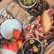 Load image into Gallery viewer, Serves up to 8 people. Medium Grazing Boxes are an intelligent way to conveniently cater any casual or formal event or occasion and contains: Cheese - two hard, one soft Cured meat (200g two varieties - upgrade includes additional 150g) Dip - two variations Antipasti items, dried and fresh fruit (assorted) Including a substantial range of high-quality, locally sourced produce consisting of premium cheese, cold meats, nuts and gluten (unless specified).